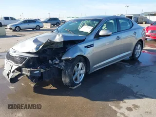 2015 Kia Optima LX with VIN 5XXGM4A71FG484306, listed as a IAAI auction lot 41797482 with 116,181 mi miles and . Bid and sale history available at carsss.com. Image 2.