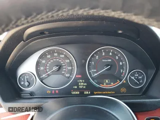 2014 BMW 4 Series 428i xDrive with VIN WBA3N5C59EF716920, listed as a Copart auction lot 53915275 with 125,300 mi miles and Salvage title. Bid and sale history available at DreamBid. Image 9.