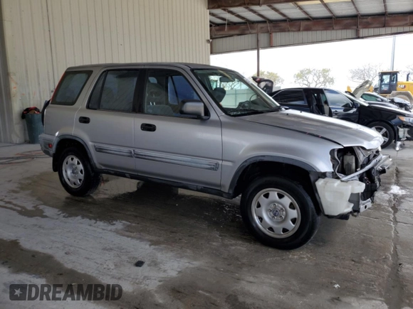 2001 Honda CR-V LX with VIN JHLRD28461C003132, listed as a Copart auction lot 51795695 with 133,027 mi miles and Salvage Title. Bid and sale history available at carsss.com. Image 4.