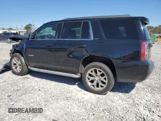 2015 GMC Yukon SLT z VIN 1GKS1BKC2FR244797, wystawiony jako Copart lot #49465995 z przebiegiem 242 448 mil mil oraz Szkoda całkowita • Salvage title. Historia ofert i sprzedaży dostępna na DreamBid. Obrazek 2.