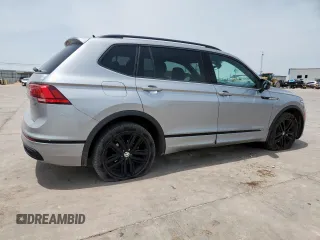 2022 Volkswagen Tiguan SE R-Line Black with VIN 3VVCB7AX5NM016910, listed as a Copart auction lot 57120005 with 54,812 mi miles and Salvage title. Bid and sale history available at DreamBid. Image 3.