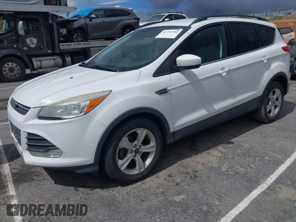 2014 Ford Escape SE with VIN 1FMCU0GX5EUC45408, listed as a IAAI auction lot 41795382 with 119,955 mi miles. Bid and sale history available at carsss.com. Image 2.
