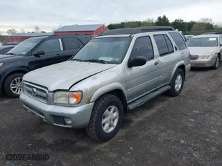 2003 Nissan Pathfinder SE with VIN JN8DR09Y73W810814, listed as a IAAI auction lot 41955769 with 303,335 mi miles. Bid and sale history available at carsss.com. Image 2.