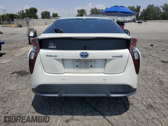 2016 Toyota Prius Four с VIN JTDKARFUXG3020768, выставлен на аукционе Copart как лот 59792815 с пробегом 112 635 миль миль и Списание • Salvage title. История ставок и продаж доступна на DreamBid. Изображение 6.
