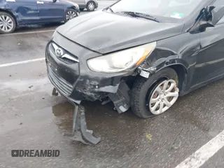 2012 Hyundai Accent GS with VIN KMHCT5AE4CU022894, listed as a IAAI auction lot 42318881 with 179,819 mi miles and . Bid and sale history available at DreamBid. Image 17.