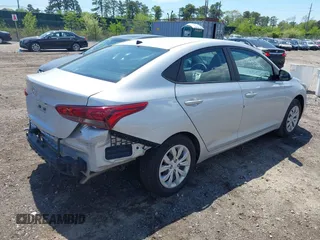 2022 Hyundai Accent SE with VIN 3KPC24A60NE179575, listed as a IAAI auction lot 42212795 with 20,761 mi miles and . Bid and sale history available at DreamBid. Image 4.