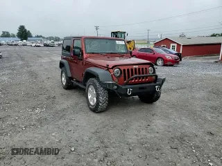 2014 Jeep Wrangler Sport with VIN 1C4AJWAG7EL197285, listed as a Copart auction lot 63451105 with 141,547 mi miles and Salvage title. Bid and sale history available at DreamBid. Image 14.
