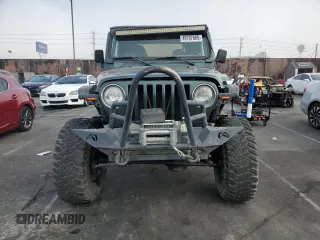 2002 Jeep Wrangler Sahara with VIN 1J4FA59S42P742978, listed as a Copart auction lot 46707685 with 77,272 mi miles and Salvage Title. Bid and sale history available at carsss.com. Image 5.