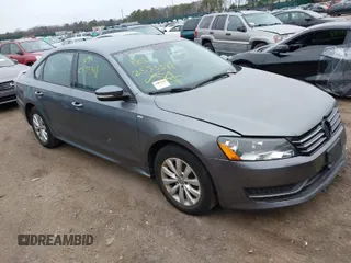 2015 Volkswagen Passat 1.8T Limited Edition with VIN 1VWAT7A33FC043278, listed as a IAAI auction lot 41927614 with 999,999 mi miles. Bid and sale history available at carsss.com. Image 1.