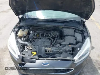 2016 Ford Focus SE z VIN 1FADP3F2XGL298174, wystawiony jako IAAI lot #42468032 z przebiegiem 236 803 mil mil oraz . Historia ofert i sprzedaży dostępna na DreamBid. Obrazek 10.