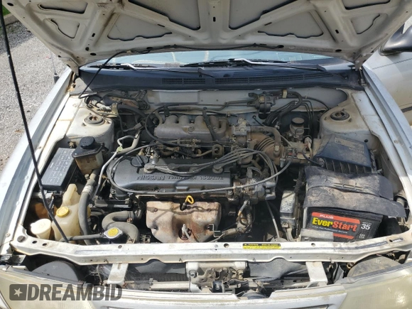 1996 Nissan Sentra XE z VIN 3N1AB41DXTL004753, wystawiony jako Copart lot #47585125 z przebiegiem 239 957 mil mil oraz Szkoda całkowita • Salvage title. Historia ofert i sprzedaży dostępna na DreamBid. Obrazek 11.