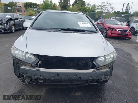 2009 Honda Civic Cpe LX with VIN 2HGFG12669H524342, listed as a IAAI auction lot 42061391 with 162,369 mi miles. Bid and sale history available at carsss.com. Image 12.