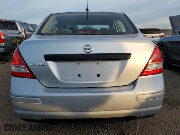 2009 Nissan Versa 1.6 with VIN 3N1CC11E39L422903, listed as a Copart auction lot 86427444 with 90,519 mi miles and Salvage Title. Bid and sale history available at carsss.com. Image 6.