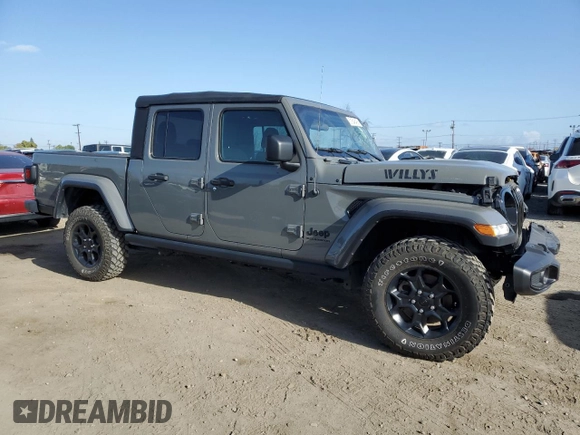 2023 Jeep Gladiator Willys z VIN 1C6HJTAG0PL561098, wystawiony jako Copart lot #51646485 z przebiegiem 20 554 mil mil oraz Szkoda całkowita • Salvage title. Historia ofert i sprzedaży dostępna na DreamBid. Obrazek 4.