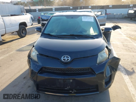 2011 Scion xD with VIN JTKKU4B46B1009909, listed as a IAAI auction lot 41959824 with 185,764 mi miles. Bid and sale history available at carsss.com. Image 12.