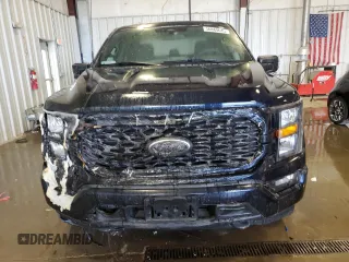 2023 Ford F-150 XL с VIN 1FTEW1EP2PFD18872, выставлен на аукционе Copart как лот 56884645 с пробегом 29 001 миль миль и Списание • Salvage title. История ставок и продаж доступна на DreamBid. Изображение 5.