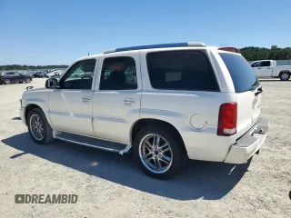 2004 Cadillac Escalade with VIN 1GYEC63T94R142929, listed as a Copart auction lot 58657835 with 147,193 mi miles and Clean title. Bid and sale history available at DreamBid. Image 2.