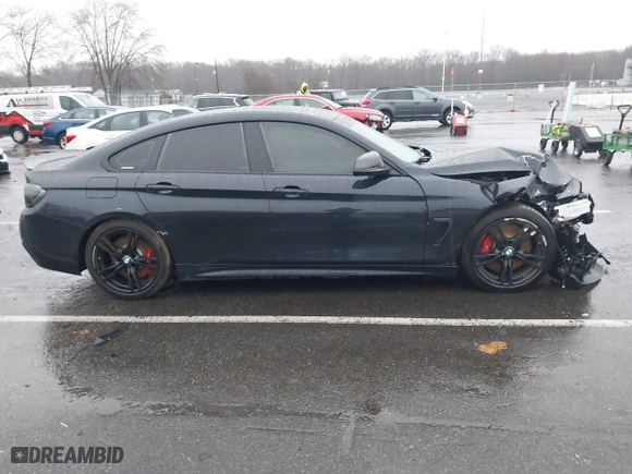 2017 BMW 4 Series 440i xDrive with VIN WBA4E5C37HG189560, listed as a IAAI auction lot 41810525 with 123,308 mi miles. Bid and sale history available at carsss.com. Image 14.
