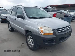2005 Kia Sportage LX with VIN KNDJF723757087655, listed as a IAAI auction lot 41706354 with 164,736 mi miles and . Bid and sale history available at carsss.com. Image 1.