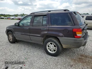 2004 Jeep Grand Cherokee Laredo with VIN 1J4GW48S64C121057, listed as a Copart auction lot 67765474 with 166,359 mi miles and Salvage title. Bid and sale history available at DreamBid. Image 2.