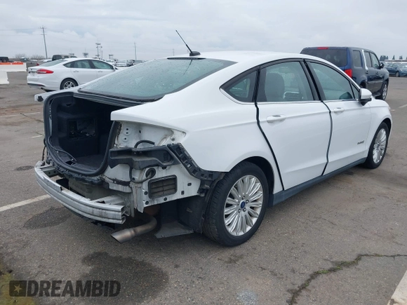 2015 Ford Fusion S Hybrid with VIN 3FA6P0UU2FR283244, listed as a IAAI auction lot 41740108 with 141,739 mi miles. Bid and sale history available at carsss.com. Image 4.