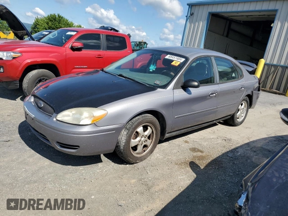 2006 Ford Taurus SE with VIN 1FAFP53U36A262525, listed as a Copart auction lot 86797374 with 179,508 mi miles and Salvage title. Bid and sale history available at DreamBid. Image 1.