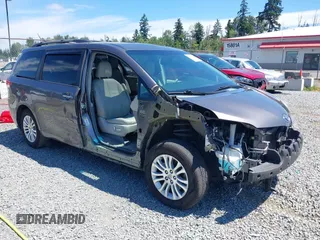 2014 Toyota Sienna XLE with VIN 5TDYK3DCXES498201, listed as a IAAI auction lot 42649463 with 107,782 mi miles and . Bid and sale history available at DreamBid. Image 1.