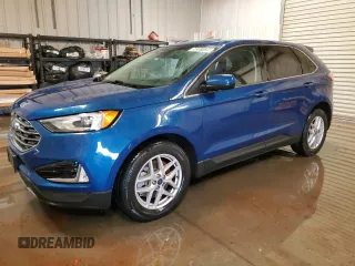 2021 Ford Edge SEL z VIN 2FMPK3J96MBA50361, wystawiony jako Copart lot #58307635 z przebiegiem 124 053 mil mil oraz Czysty tytuł • Clean title. Historia ofert i sprzedaży dostępna na DreamBid. Obrazek 1.