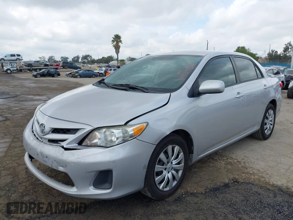 2012 Toyota Corolla L with VIN 2T1BU4EE9CC803165, listed as a IAAI auction lot 41924436 with 257,724 mi miles. Bid and sale history available at carsss.com. Image 2.