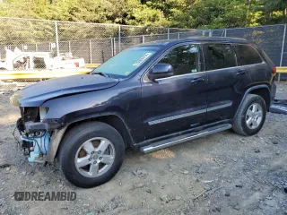 2011 Jeep Grand Cherokee Laredo z VIN 1J4RR4GG7BC622792, wystawiony jako Copart lot #70002414 z przebiegiem 103 682 mil mil oraz Szkoda całkowita • Salvage title. Historia ofert i sprzedaży dostępna na DreamBid. Obrazek 1.