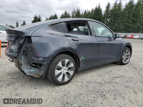 2024 Tesla Model Y Long Range with VIN 7SAYGDEE9RF069801, listed as a Copart auction lot 60857145 with 18,808 mi miles and Salvage title. Bid and sale history available at DreamBid. Image 3.