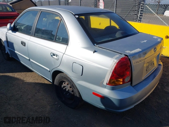 2004 Hyundai Accent GL with VIN KMHCG45C14U547954, listed as a IAAI auction lot 41350219 with 138,436 mi miles. Bid and sale history available at carsss.com. Image 3.