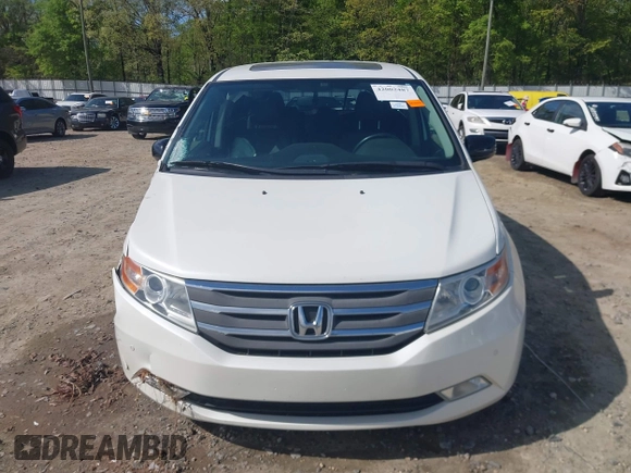 2013 Honda Odyssey Touring with VIN 5FNRL5H96DB009694, listed as a IAAI auction lot 42002487 with 182,867 mi miles and . Bid and sale history available at carsss.com. Image 12.
