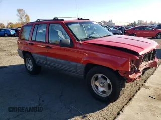 1998 Jeep Grand Cherokee Laredo with VIN 1J4GZ58S3WC245142, listed as a Copart auction lot 79434534 with 276,971 mi miles and Salvage Title. Bid and sale history available at carsss.com. Image 4.