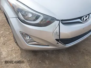 2016 Hyundai Elantra SE z VIN 5NPDH4AE1GH727236, wystawiony jako IAAI lot #39440992 z przebiegiem 76 917 mil mil oraz . Historia ofert i sprzedaży dostępna na DreamBid. Obrazek 14.