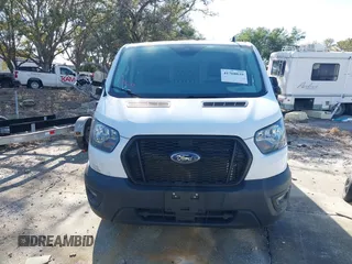 2023 Ford Transit Cargo with VIN 1FTBR1Y82PKA22661, listed as a IAAI auction lot 41768039 with 30,800 mi miles and . Bid and sale history available at DreamBid. Image 13.