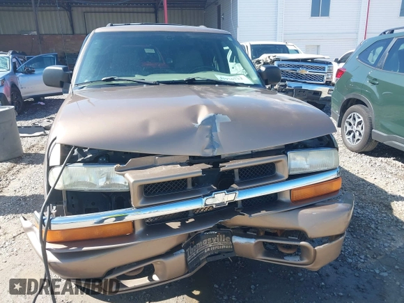 2004 Chevrolet Blazer LS z VIN 1GNDT13X24K167825, wystawiony jako IAAI lot #41976732 z przebiegiem 142 647 mil mil oraz . Historia ofert i sprzedaży dostępna na DreamBid. Obrazek 6.