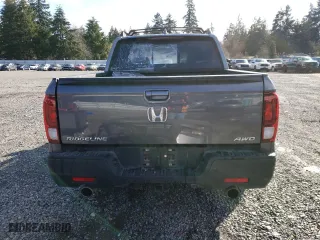 2021 Honda Ridgeline RTL-E with VIN 5FPYK3F7XMB016871, listed as a Copart auction lot 49159985 with 26,775 mi miles and Salvage Title. Bid and sale history available at carsss.com. Image 6.