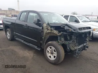 2015 Toyota Tundra SR with VIN 5TFUM5F15FX063940, listed as a IAAI auction lot 42463955 with 134,961 mi miles and . Bid and sale history available at DreamBid. Image 1.