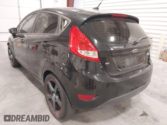 2013 Ford Fiesta SE with VIN 3FADP4EJ5DM195186, listed as a IAAI auction lot 42046227 with 137,794 mi miles. Bid and sale history available at carsss.com. Image 3.