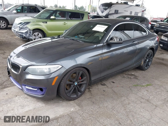 2014 BMW 2 Series 228i with VIN WBA1F5C5XEV255284, listed as a IAAI auction lot 41895642 with 62,079 mi miles and . Bid and sale history available at carsss.com. Image 2.