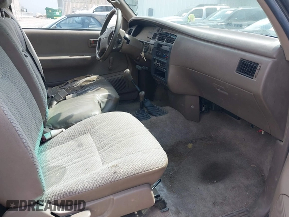 1996 Toyota T100 DX with VIN JT4UN22D9T0034196, listed as a IAAI auction lot 41969849 with 211,309 mi miles and . Bid and sale history available at carsss.com. Image 5.