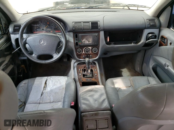 2002 Mercedes-Benz M-Class with VIN 4JGAB54E52A360097, listed as a Copart auction lot 72983104 with 199,445 mi miles and Salvage Title. Bid and sale history available at carsss.com. Image 8.