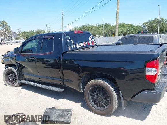 2019 Toyota Tundra SR with VIN 5TFUY5F13KX852912, listed as a IAAI auction lot 42327399 with 124,193 mi miles and . Bid and sale history available at DreamBid. Image 14.