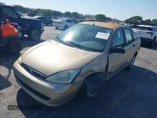 2002 Ford Focus SE with VIN 1FAFP34372W307389, listed as a IAAI auction lot 41287039 with Not Provided miles and . Bid and sale history available at carsss.com. Image 6.