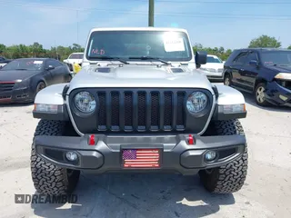 2023 Jeep Wrangler Rubicon with VIN 1C4JJXFG0PW522651, listed as a IAAI auction lot 42112210 with 7,744 mi miles and . Bid and sale history available at carsss.com. Image 13.