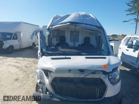 2022 Ford Transit Cargo with VIN 1FTBR3X81NKA63860, listed as a IAAI auction lot 42323904 with 94,473 mi miles and . Bid and sale history available at DreamBid. Image 6.
