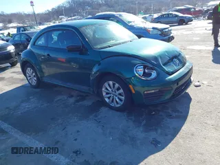 2017 Volkswagen Beetle 1.8T Fleet with VIN 3VWF17AT6HM618275, listed as a IAAI auction lot 41318611 with 134,594 mi miles. Bid and sale history available at carsss.com. Image 1.