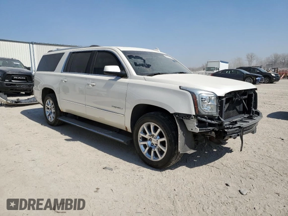 2015 GMC Yukon XL Denali with VIN 1GKS2JKJ3FR585809, listed as a Copart auction lot 48219925 with 191,102 mi miles and Salvage Title. Bid and sale history available at DreamBid. Image 4.