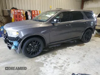2015 Dodge Durango R/T with VIN 1C4SDJCT3FC870230, listed as a Copart auction lot 58050805 with 143,758 mi miles and Salvage title. Bid and sale history available at DreamBid. Image 1.